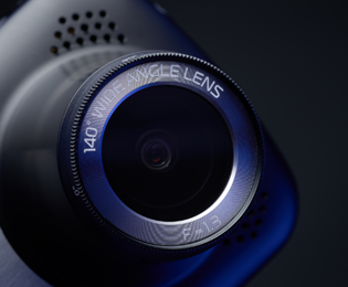 Close up image of a wide angle dash camera lens